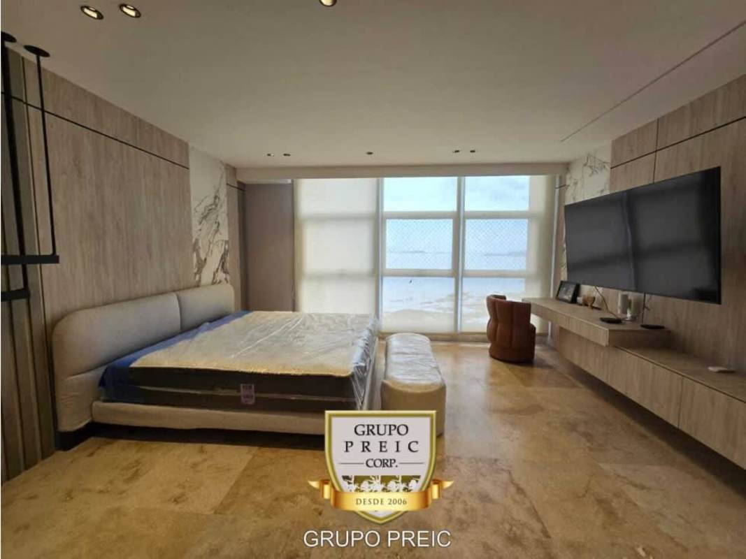 Luxury master bedroom with ocean view windows at PH Q Tower Punta Pacifica Panama