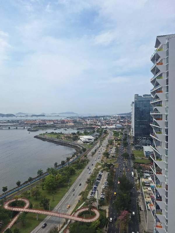 Private balcony with panoramic ocean and city view from high rise PH Rivage Panama