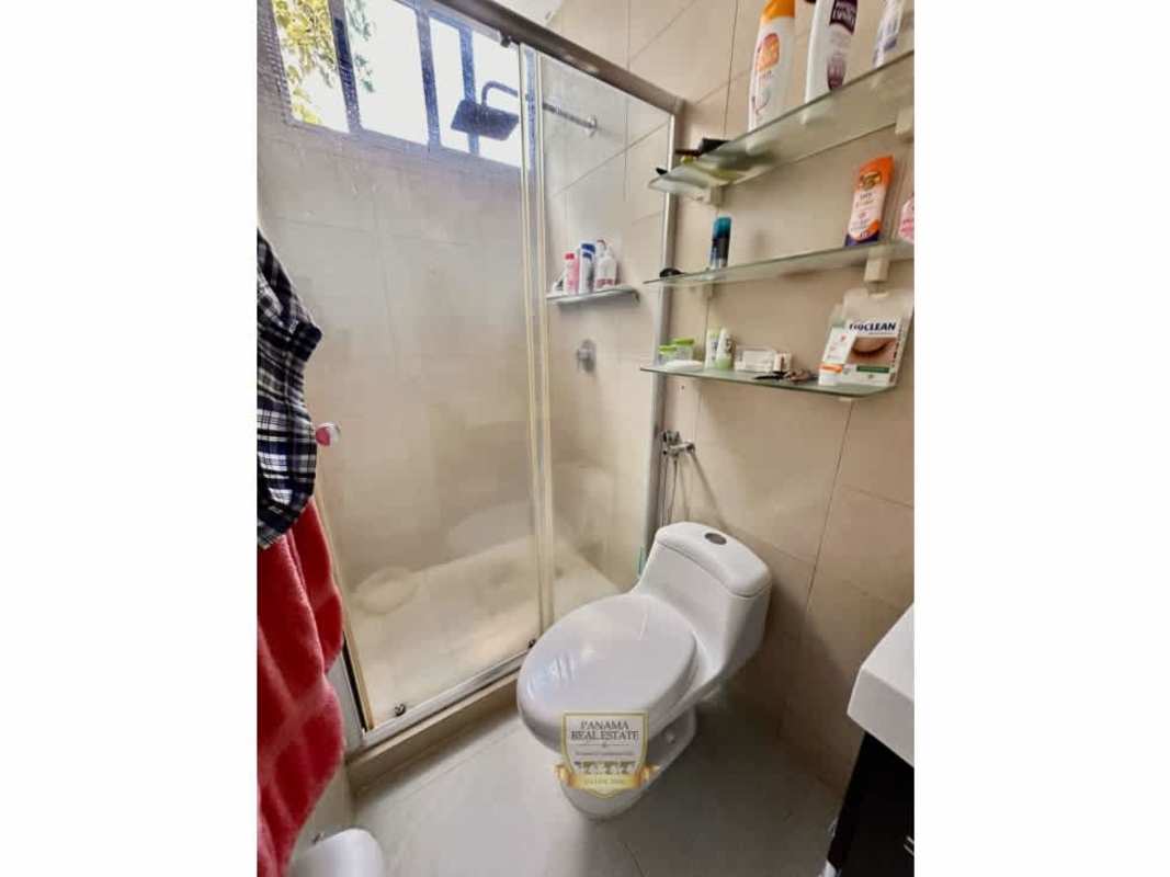 Renovated bathroom with glass shower, modern fixtures in PH Carrasquilla Park Panama