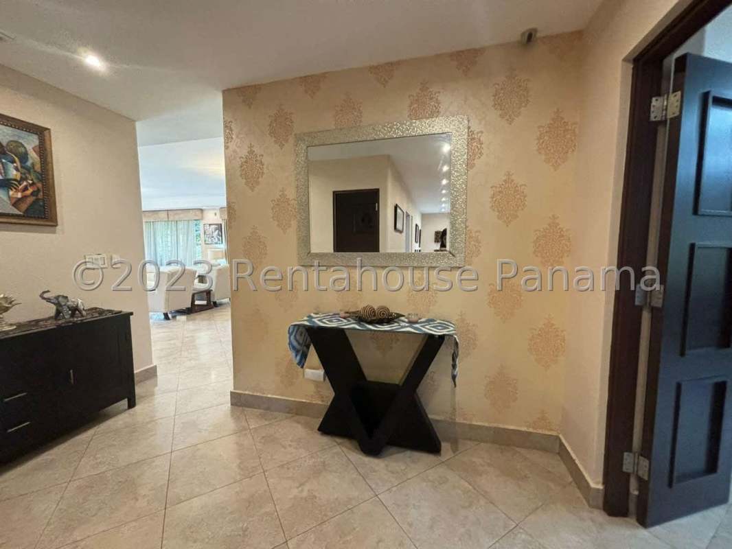 Contemporary kitchen with granite countertops and center island PH Embassy Club Clayton Panama