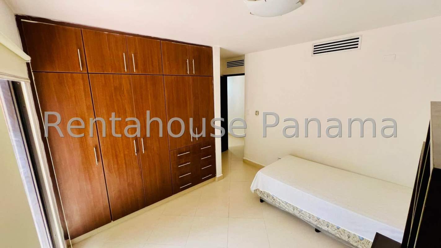 Bathroom with glass shower and ceramic tiles at Embassy Club Panama