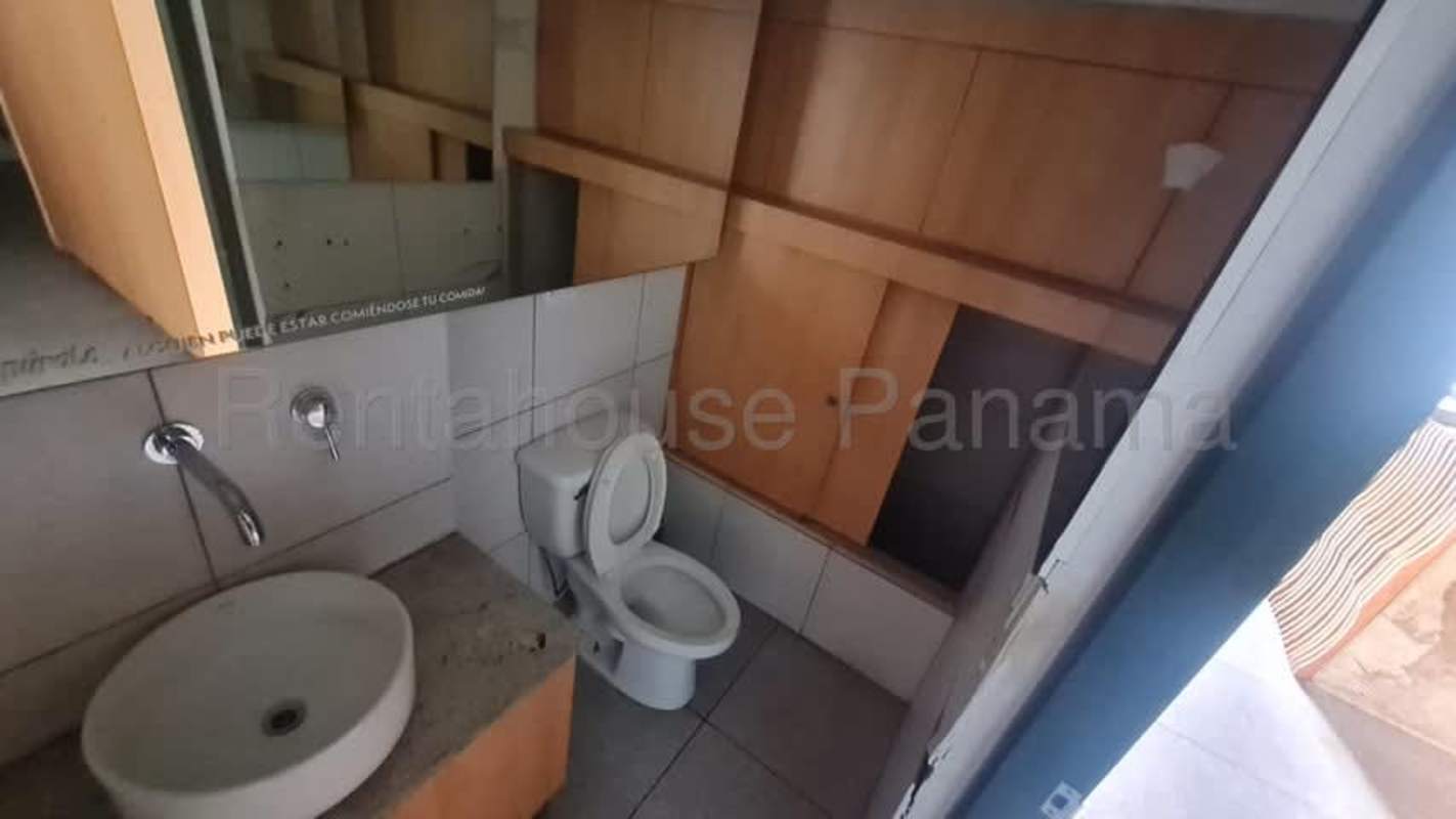 Two-level open commercial space with mezzanine, industrial design and kitchen zone Panama City