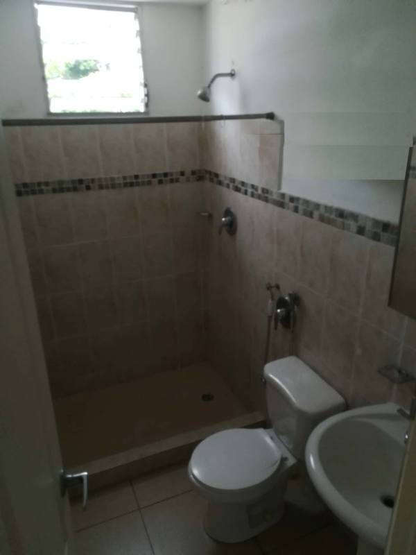 Modern living room with tile floors, large windows and AC PH Bella Vista Garden Panama City