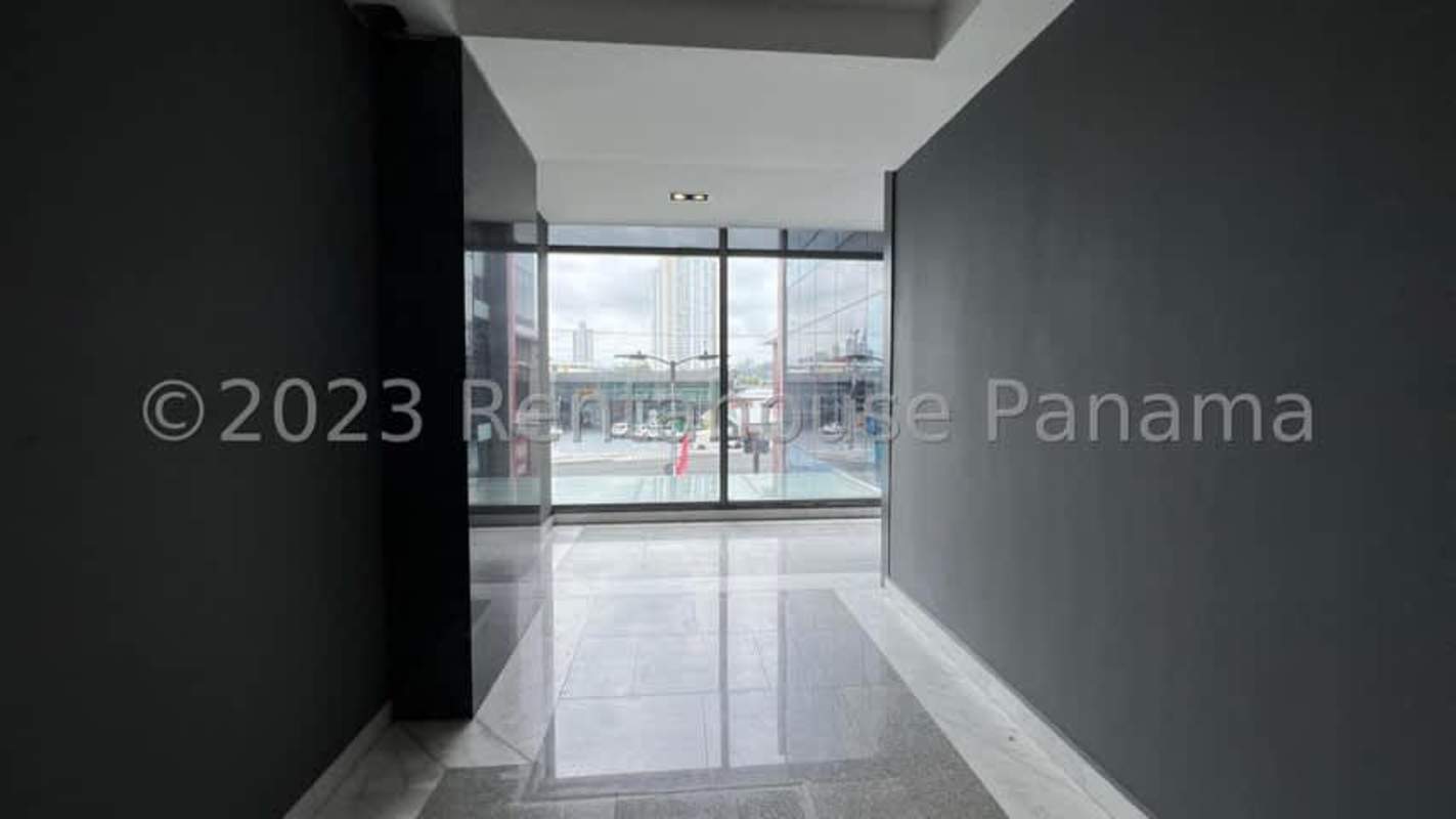 Lobby area with elevator marble finishes in commercial plaza San Francisco Panama