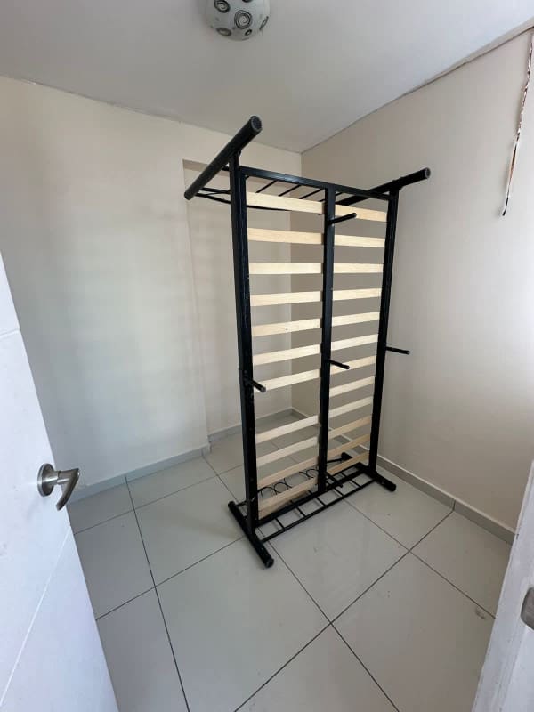 Small bedroom or office space with tile flooring window at PH Bella Vista Panama