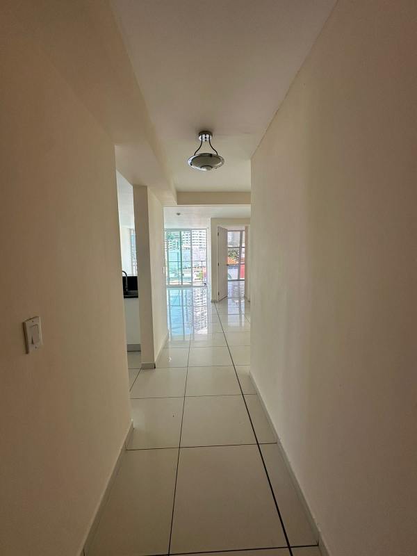Unfurnished bedroom with large window bright light tiled floor PH Bella Vista Panama City