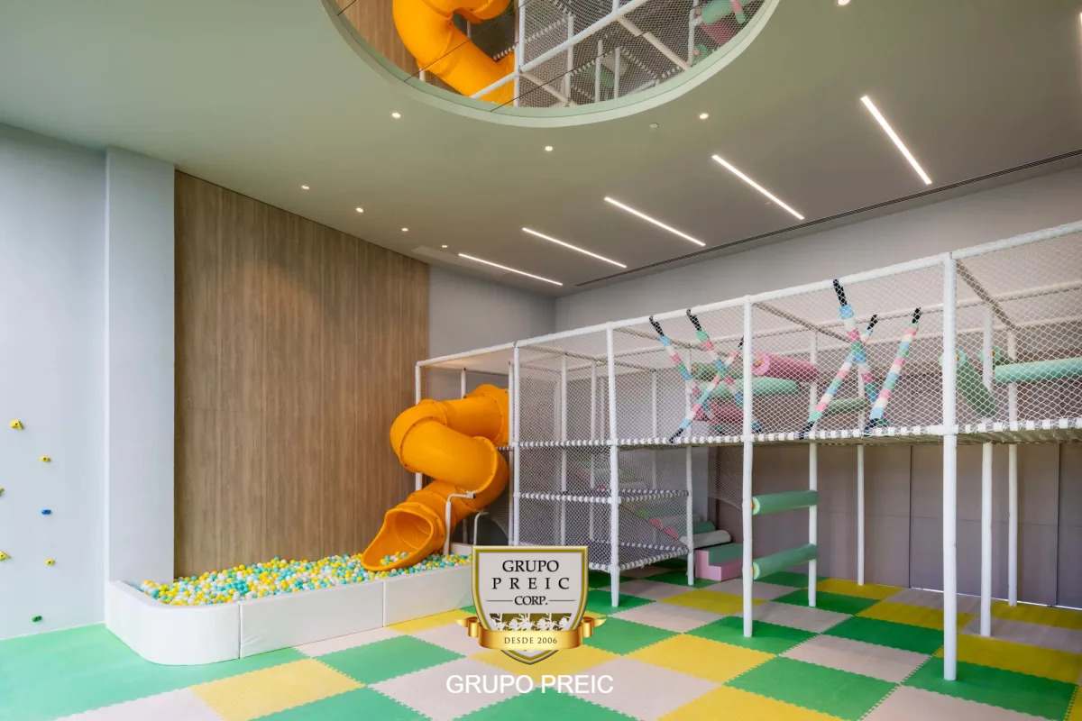 Colorful indoor kids playground with slide ball pit at PH The Towers Punta Paitilla