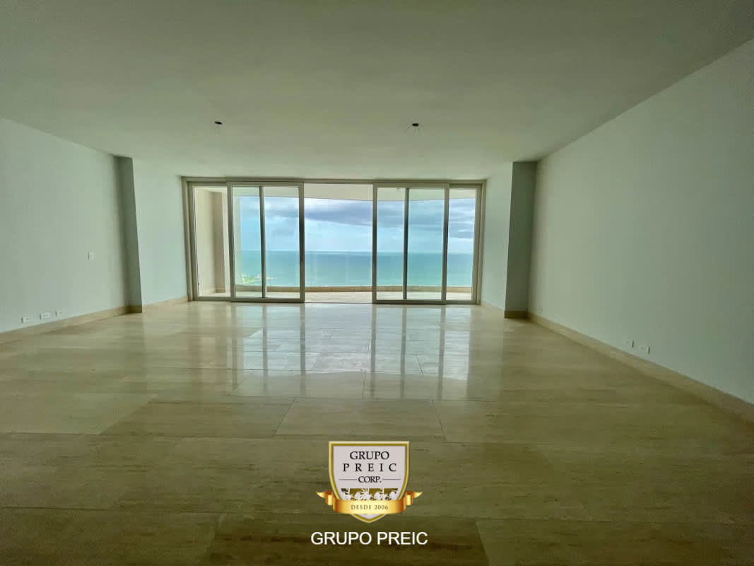 Large living room space with sliding glass doors and ocean view Punta Paitilla