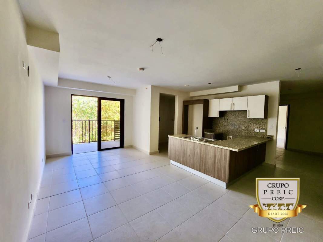 Open living dining room balcony new apartment PH Embassy Village Clayton Panama