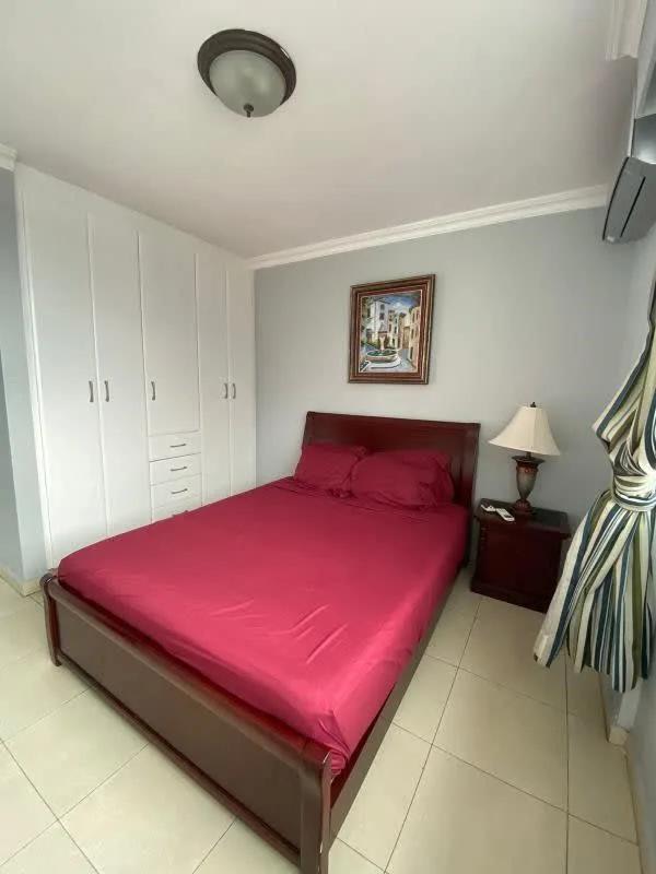 Bright living space with armchairs, decor and fan in PH Solaris Panama