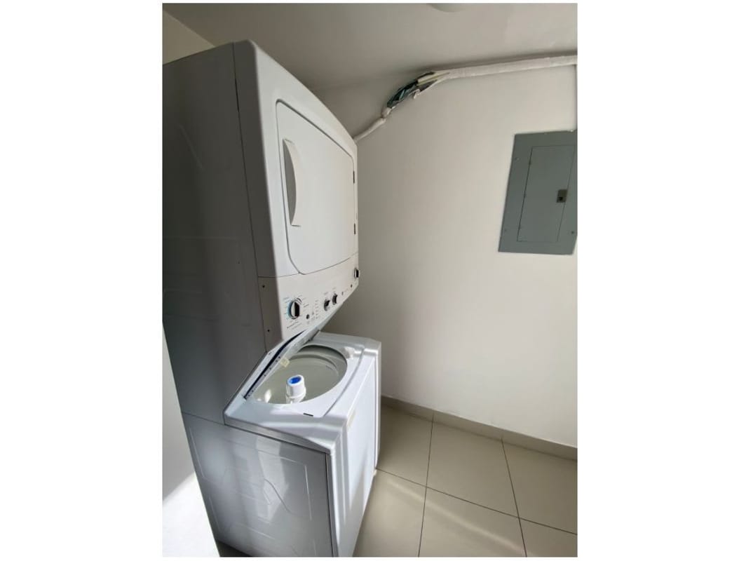 Laundry area with washer/dryer hookups and utility connections at PH Centennial Panama