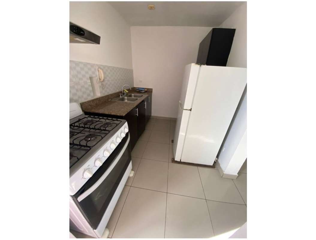 Compact modern kitchen with granite countertops, gas stove, double sink in PH Centennial Parque Lefevre Panama