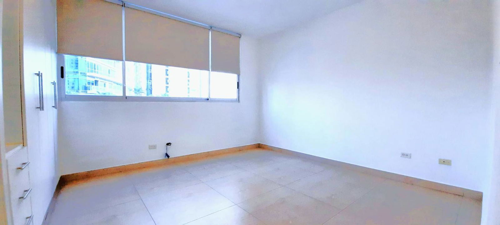 Second bedroom with large window, ocean and skyline views Vista del Mar Panama