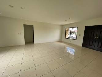Bedroom with big window AC tile flooring rental home David Chiriquí