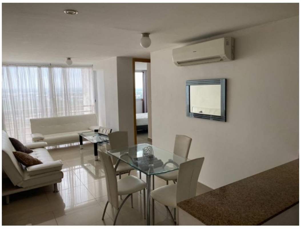 Bright living dining room layout with city view windows PH Vía Cincuentenario Panama apartment