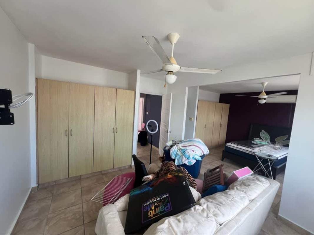 Spacious bedroom with wardrobes, fans and ceramic floor PH Everest in Brisas del Golf Panama