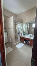 Bathroom with glass shower and vanity Punta Barco Village