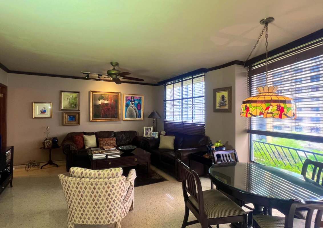 Kitchen with wood cabinets and gas stove Vista Bella Plaza Panama City