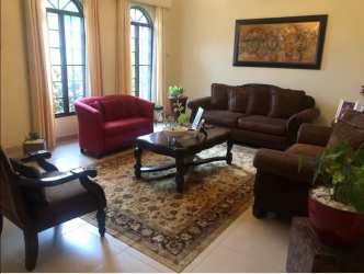 Formal dining area in Mediterranean style house with high ceilings, traditional decor La Chorrera Panama