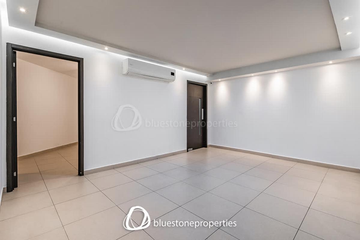 Kitchen with granite countertops, wood cabinetry and stainless appliances PH Ocean View Costa del Este Panama