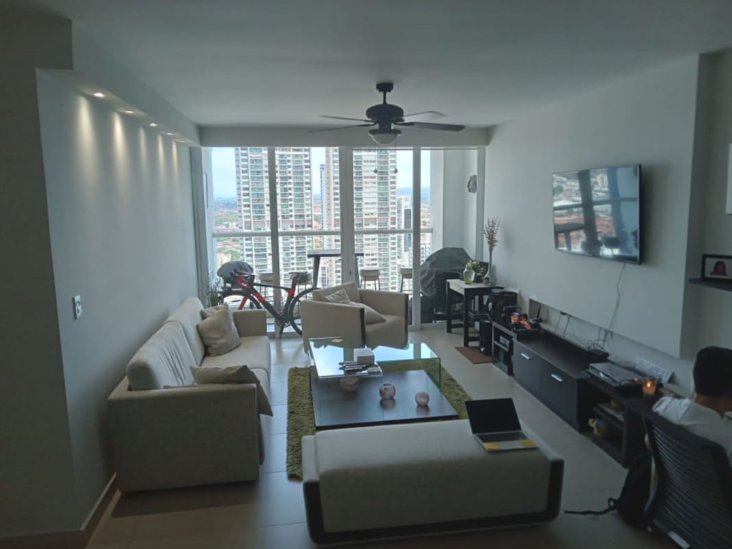 Dining area with modern chandelier and city views PH Country Club Costa del Este Panama