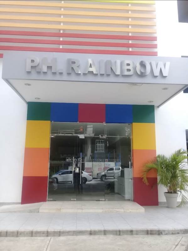 Bathroom with glass shower and mosaic accent wall PH Rainbow Tower El Carmen Panama