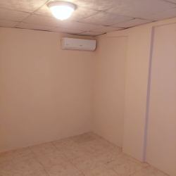 Unfurnished interior with tile flooring, split AC and ceiling light El Nazareno Panama