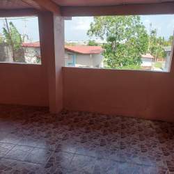 Compact minimalist kitchen with single sink tile backsplash El Nazareno Colon