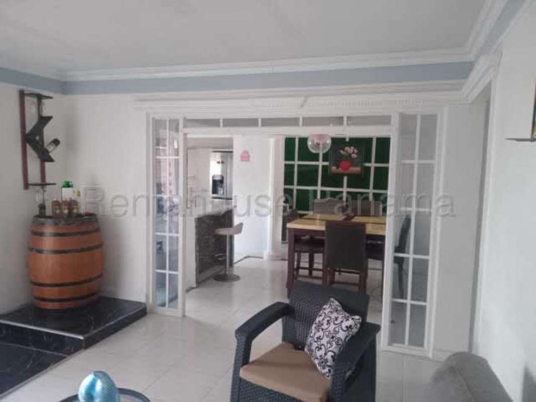 Updated modern kitchen island dining area in Don Bosco house Panama City