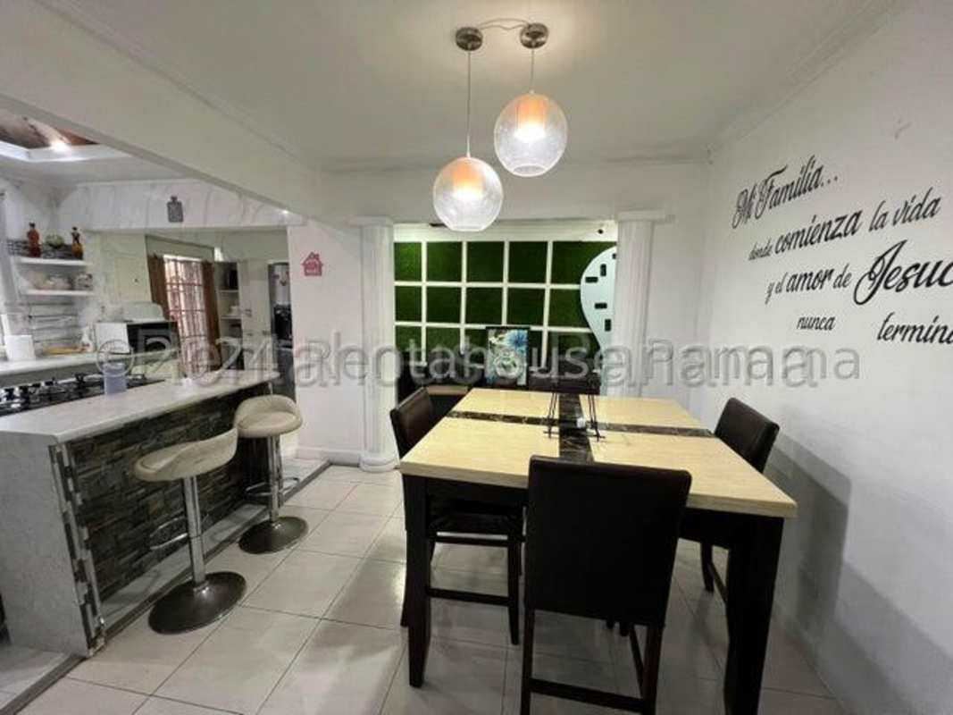 Marble-style counters and pendant lights in Don Bosco house kitchen Panama