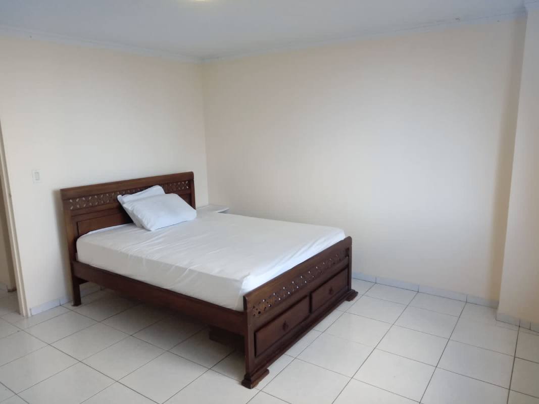 Outdoor swimming pool and lounge deck at PH El Cangrejo Residences Panama