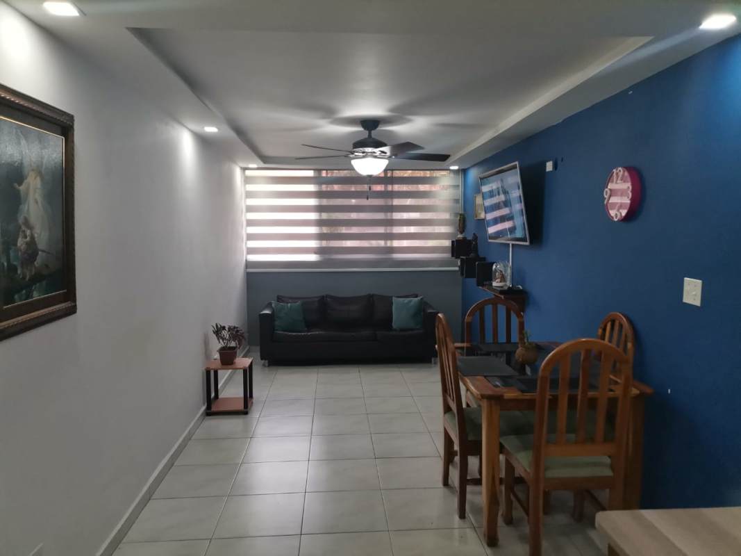 Modern kitchen with granite countertop, gas stove, cabinets and appliances in Llano Bonito Panama City