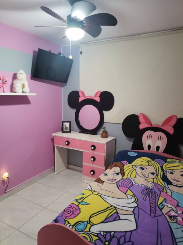 Playful pink children's bedroom Disney decor Llano Bonito Panama
