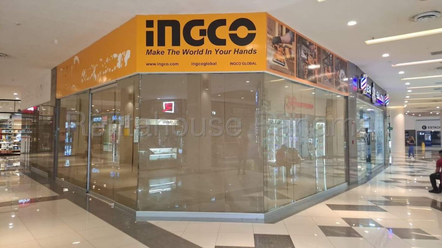 Empty retail unit with glass doors and signage inside El Dorado Shopping Center Panama