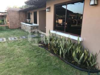 Spacious master bedroom with ensuite bath in gated community house Chitré