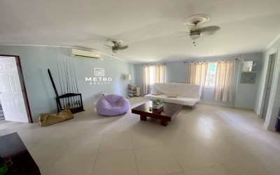 Private floating dock with shelter surrounded by water and lush nature on Gatun Lake Panama