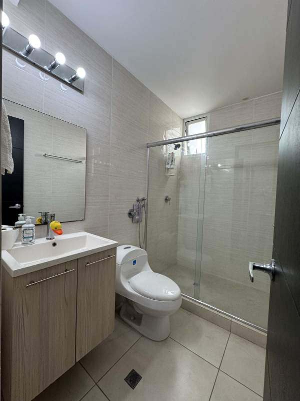 Social area swimming pool overlooking skyline at Park Avenue Tower Panama City