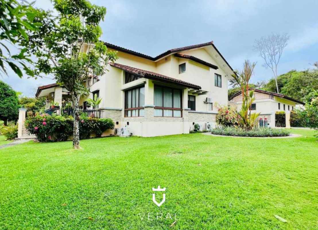 Contemporary in-home bar with granite counter and red stools in upscale Clayton house