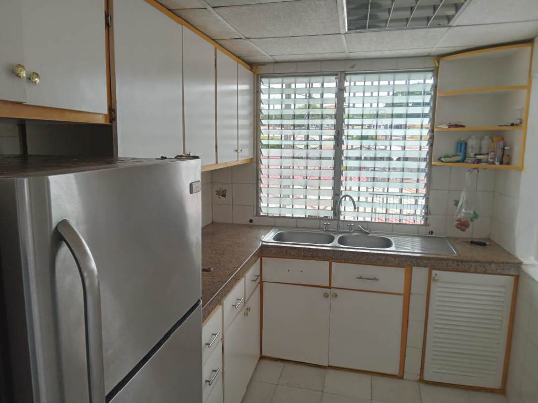 Kitchen with cabinets, granite counters, window, refrigerator, stove in Villa Lucre Panama
