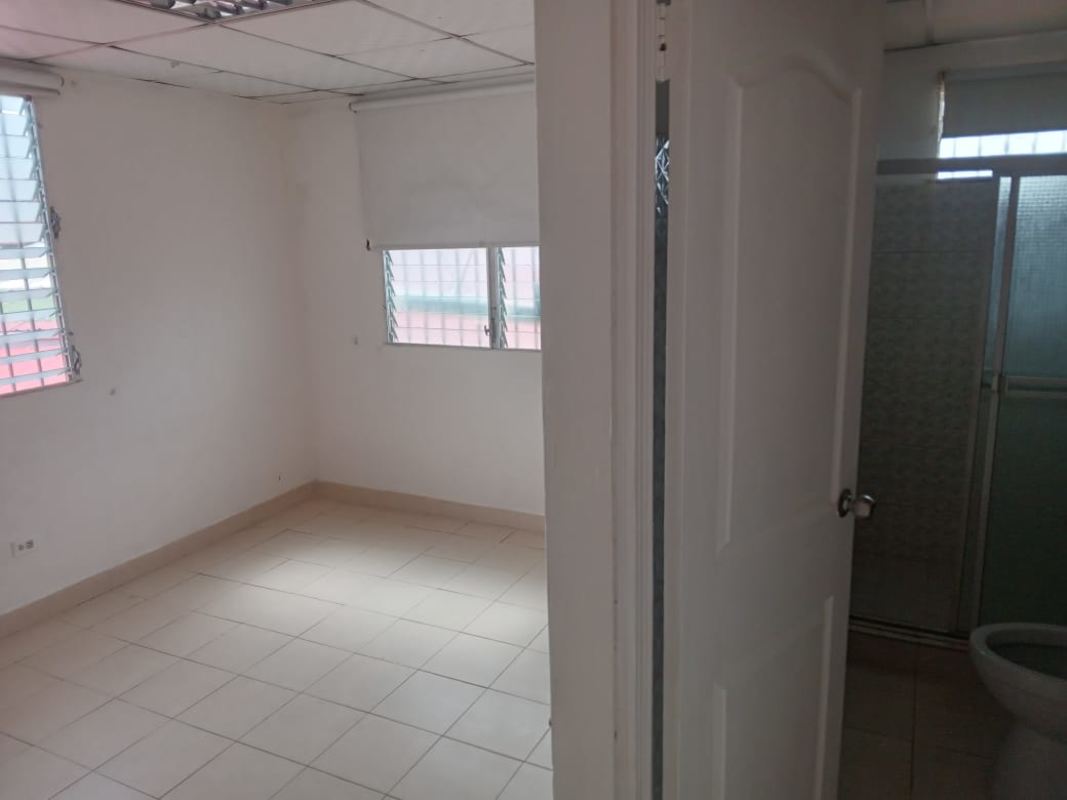 Bedroom with built-in closet, tiled floors and window Villa Lucre rental Panama