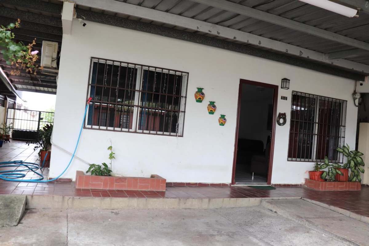 Exterior porch area with plants and iron bars Punta del Este Panama