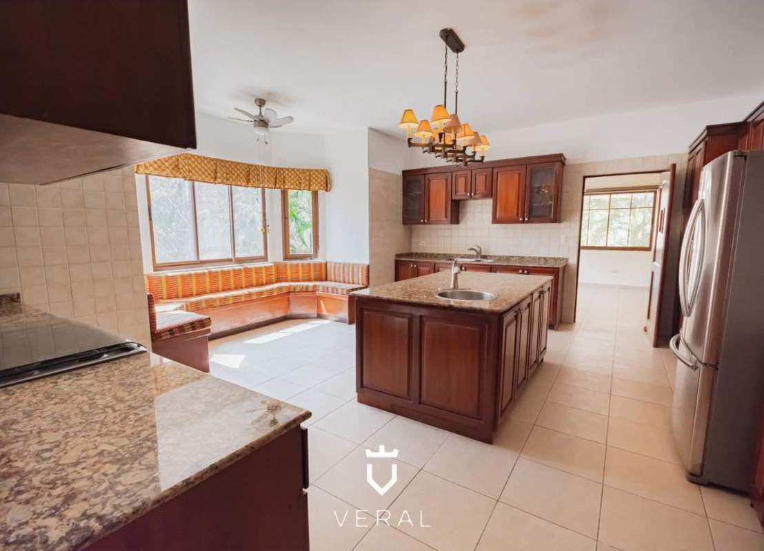 Luxury kitchen with granite island and wood cabinets Clayton Panama