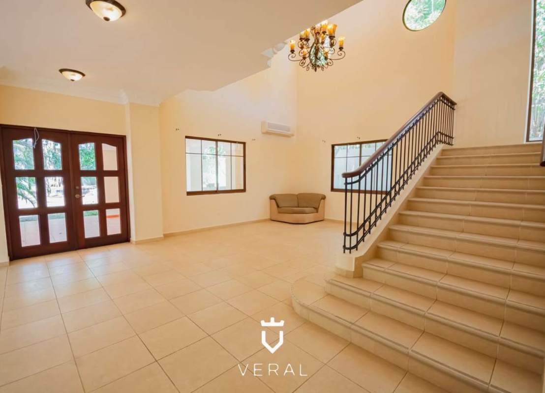 Traditional kitchen with wood cabinets, granite countertops, island Clayton Panama