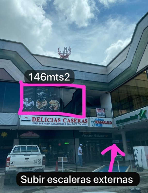 Exterior view showing Plaza Mirage signage, stores, and ample parking on Ricardo Alfaro Panama City