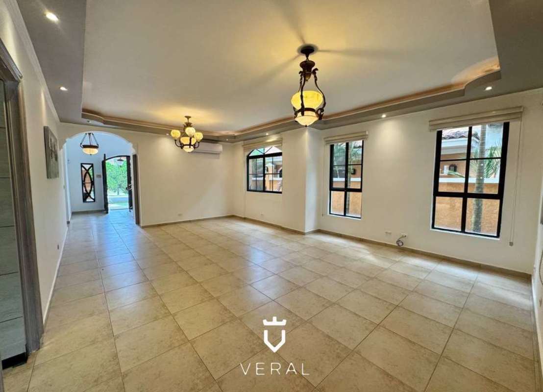 Living room with marble floor, recessed lighting, large windows in luxury home Clayton Panama