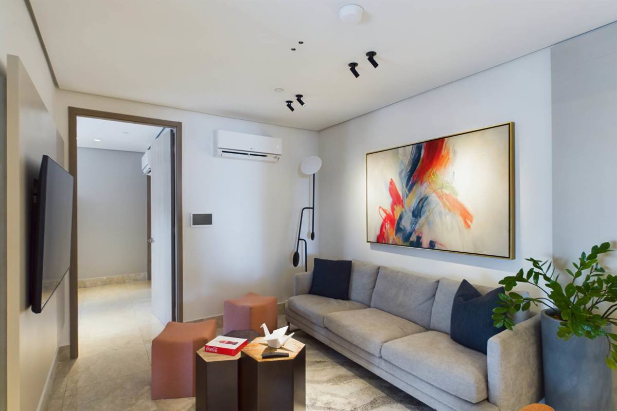 Living room with panoramic windows skyline and bay views PH Costanera Bella Vista Panama