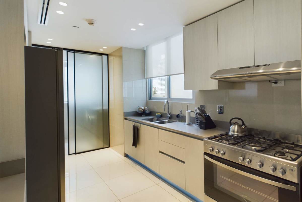 Spacious master bedroom with skyline views and ensuite bathroom in PH Costanera Panama