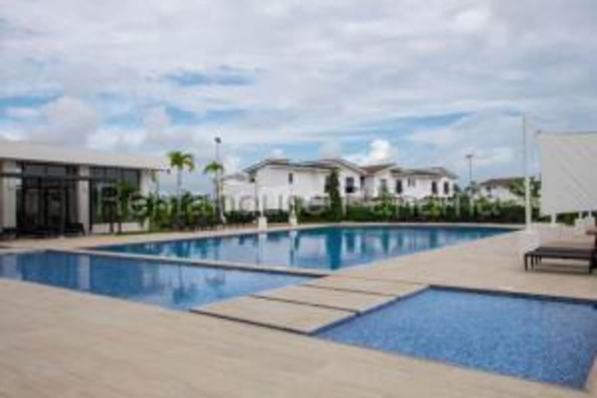 Recreational swimming pool with palm trees and pool deck PH Costa Linda Costa Sur Panama