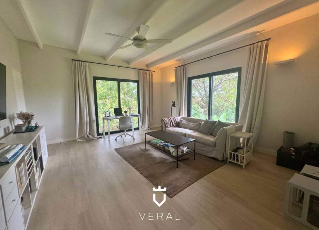 Bright living and family room with marble floors and lush garden views in Cardenas Village Clayton Panama