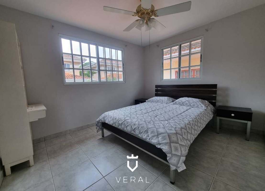 Traditional kitchen with granite counters and breakfast bar in Altos de Panamá Panama